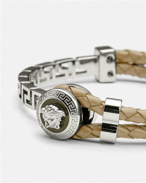 versace bracelet womens silver|Versace braided leather charm bracelet.